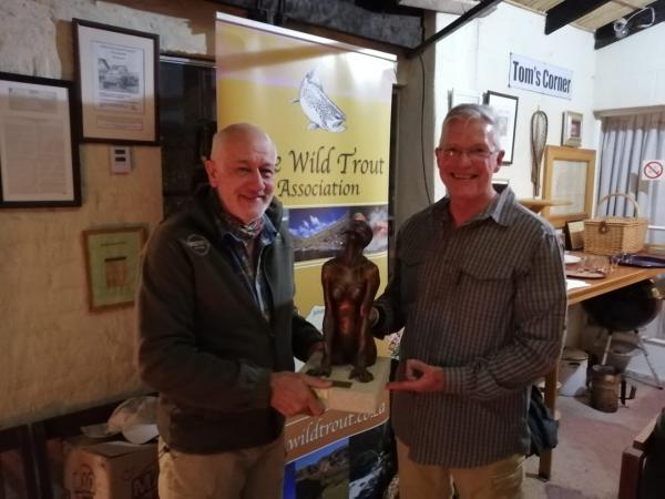 Jan Korrubel presenting Peter Brigg with the